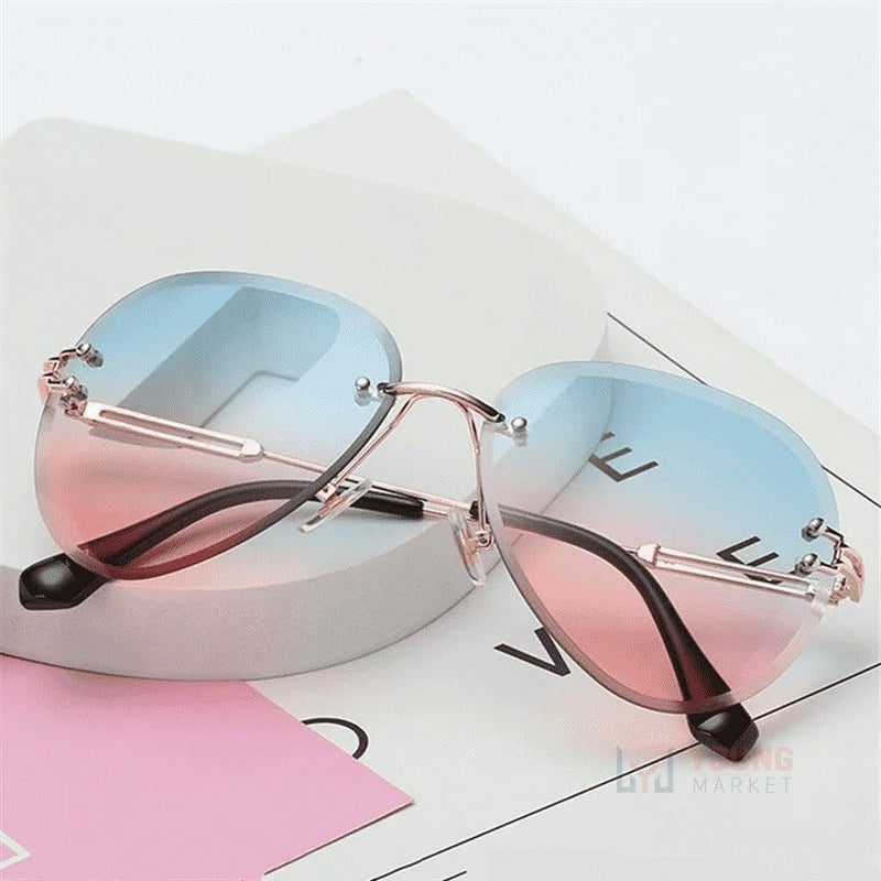 Óculos de Sol Feminino sem Aro com Proteção UV e UVB Azul com rosa bebê Young Market